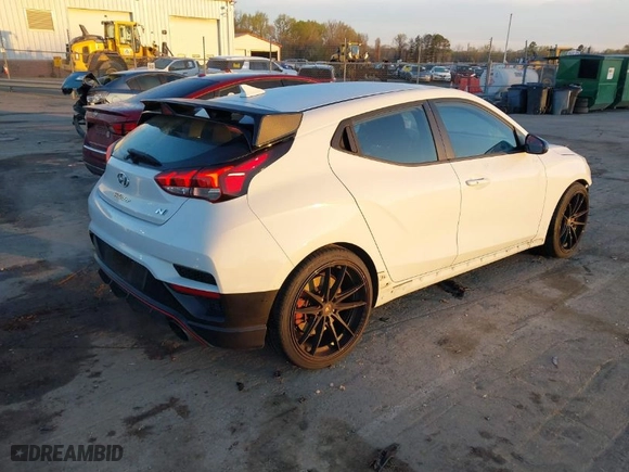 2020 Hyundai Veloster N with VIN KMHT36AH9LU003354, listed as a IAAI auction lot 41834090 with 61,863 mi miles. Bid and sale history available at carsss.com. Image 4.