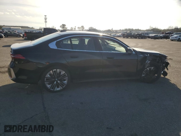 2024 BMW 5 Series 530i xDrive with VIN WBA53FJ00RCS00741, listed as a Copart auction lot 84899434 with 7,103 mi miles and Salvage Title. Bid and sale history available at carsss.com. Image 3.
