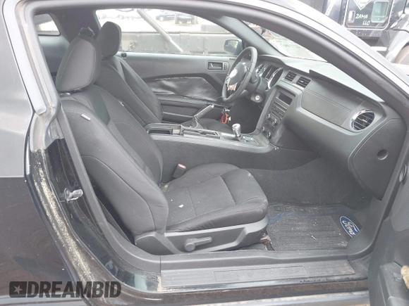 2012 Ford Mustang Premium with VIN 1ZVBP8AM6C5233888, listed as a IAAI auction lot 42714667 with 153,219 mi miles and . Bid and sale history available at DreamBid. Image 5.