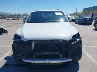 2015 Audi Q7 3.0T S line Prestige with VIN WA1DGAFE0FD027782, listed as a IAAI auction lot 41856552 with 116,563 mi miles. Bid and sale history available at carsss.com. Image 13.