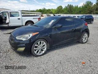 2012 Hyundai Veloster w/Black Int z VIN KMHTC6AD4CU061160, wystawiony jako Copart lot #54139415 z przebiegiem 124 468 mil mil oraz Czysty tytuł • Clean title. Historia ofert i sprzedaży dostępna na DreamBid. Obrazek 1.