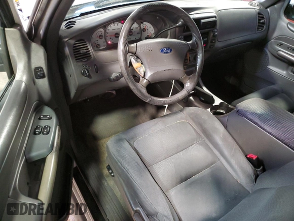 2001 Ford Explorer Sport with VIN 1FMYU70E81UA67897, listed as a Copart auction lot 57620075 with 225,597 mi miles and Salvage title. Bid and sale history available at DreamBid. Image 8.