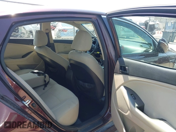 2014 Kia Optima LX with VIN 5XXGM4A70EG273483, listed as a IAAI auction lot 42402765 with 129,770 mi miles and . Bid and sale history available at DreamBid. Image 8.