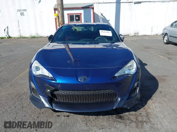 2013 Scion FR-S with VIN JF1ZNAA11D2702415, listed as a IAAI auction lot 40381041 with 63,581 mi miles. Bid and sale history available at carsss.com. Image 12.