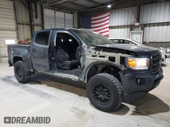 2019 GMC Canyon 4WD All Terrain w/Cloth with VIN 1GTG6FEN6K1120371, listed as a Copart auction lot 41828045 with 104,178 mi miles and Salvage Title. Bid and sale history available at carsss.com. Image 4.