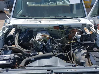 1990 Ford F-150 with VIN 1FTEF14N0LKA50583, listed as a IAAI auction lot 41991153 with 75,504 mi miles. Bid and sale history available at carsss.com. Image 10.