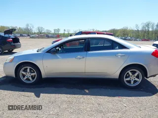 2009 Pontiac G6 1SA z VIN 1G2ZG57N694226751, wystawiony jako IAAI lot #42140636 z przebiegiem 144 890 mil mil oraz . Historia ofert i sprzedaży dostępna na DreamBid. Obrazek 14.