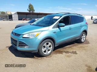2013 Ford Escape SE with VIN 1FMCU0GX6DUC54374, listed as a IAAI auction lot 42712880 with 140,966 mi miles and . Bid and sale history available at DreamBid. Image 2.