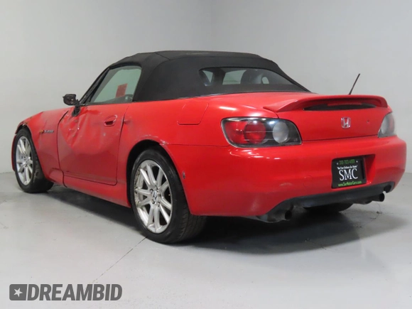2003 Honda S2000 with VIN JHMAP11423T006858, listed as a Copart auction lot 49906785 with 112,059 mi miles and Salvage Title. Bid and sale history available at DreamBid. Image 4.