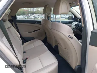 2017 Hyundai Tucson SE z VIN KM8J33A40HU383601, wystawiony jako IAAI lot #41947577 z przebiegiem 92 722 mil mil oraz . Historia ofert i sprzedaży dostępna na DreamBid. Obrazek 8.