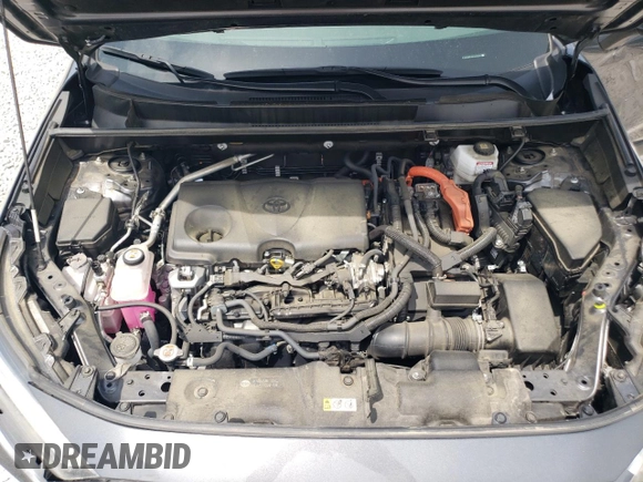 2023 Toyota RAV4 Hybrid LE with VIN JTMLWRFV8PD200078, listed as a Copart auction lot 57490185 with 67,321 mi miles and Salvage title. Bid and sale history available at DreamBid. Image 12.