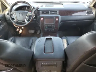 2013 GMC Yukon Denali with VIN 1GKS2EEF0DR311141, listed as a Copart auction lot 74823594 with 125,580 mi miles and Salvage Title. Bid and sale history available at carsss.com. Image 8.