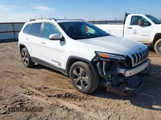 2016 Jeep Cherokee Latitude z VIN 1C4PJMCS0GW277030, wystawiony jako IAAI lot #40807423 z przebiegiem 189 503 mil mil oraz . Historia ofert i sprzedaży dostępna na DreamBid. Obrazek 1.