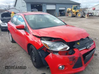 2012 Ford Focus SE with VIN 1FAHP3F24CL127903, listed as a IAAI auction lot 40821860 with 120,644 mi miles and . Bid and sale history available at DreamBid. Image 1.