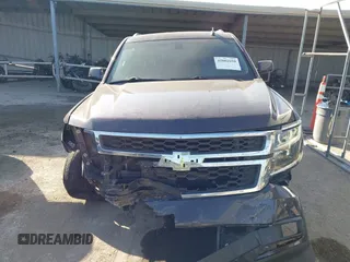 2015 Chevrolet Tahoe LS z VIN 1GNSCAKCXFR628303, wystawiony jako IAAI lot #42002698 z przebiegiem 152 141 mil mil oraz . Historia ofert i sprzedaży dostępna na DreamBid. Obrazek 12.