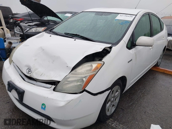 2007 Toyota Prius z VIN JTDKB20U177622142, wystawiony jako IAAI lot #41720920 z przebiegiem 140 665 mil mil oraz . Historia ofert i sprzedaży dostępna na DreamBid. Obrazek 2.