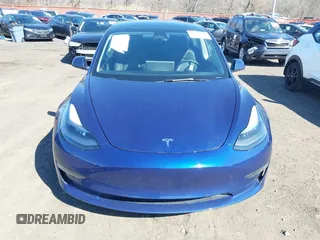 2023 Tesla Model 3 with VIN 5YJ3E1EA2PF690335, listed as a IAAI auction lot 41732701 with 22,238 mi miles and . Bid and sale history available at DreamBid. Image 12.