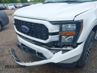 2023 Ford F-150 XL with VIN 1FTEW1CP0PKD52884, listed as a IAAI auction lot 41780292 with 60,103 mi miles and . Bid and sale history available at DreamBid. Image 6.