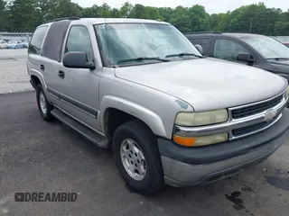 2005 Chevrolet Tahoe LS z VIN 1GNEC13V95J191596, wystawiony jako IAAI lot #42437465 z przebiegiem 275 903 mil mil oraz . Historia ofert i sprzedaży dostępna na DreamBid. Obrazek 1.