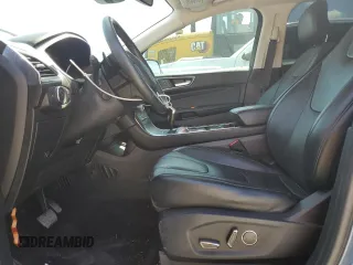 2019 Ford Edge Titanium z VIN 2FMPK4K91KBB81098, wystawiony jako Copart lot #53604115 z przebiegiem 70 179 mil mil oraz Szkoda całkowita • Salvage title. Historia ofert i sprzedaży dostępna na DreamBid. Obrazek 7.