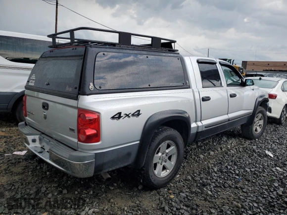 2006 Dodge Dakota SLT with VIN 1D7HW48N36S522858, listed as a Copart auction lot 66431064 with 197,028 mi miles and Salvage Title. Bid and sale history available at carsss.com. Image 3.