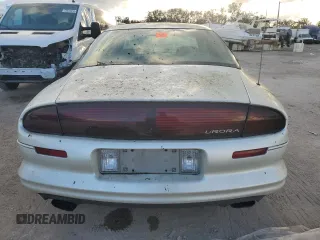 1999 Oldsmobile Aurora with VIN 1G3GR62C2X4107973, listed as a Copart auction lot 84023124 with 80,402 mi miles and Non Repairable. Bid and sale history available at DreamBid. Image 6.