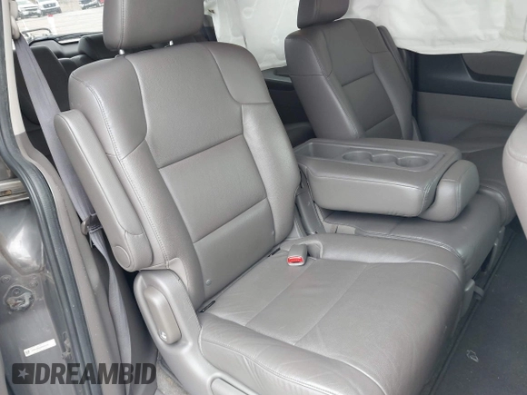 2014 Honda Odyssey EX-L with VIN 5FNRL5H62EB006346, listed as a IAAI auction lot 42061591 with 179,994 mi miles and . Bid and sale history available at DreamBid. Image 8.