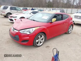 2012 Hyundai Veloster w/Black Int z VIN KMHTC6AD3CU049355, wystawiony jako IAAI lot #41783698 z przebiegiem 121 522 mil mil oraz . Historia ofert i sprzedaży dostępna na DreamBid. Obrazek 2.