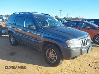 2004 Jeep Grand Cherokee Laredo z VIN 1J4GW48S24C159370, wystawiony jako IAAI lot #41296094 z przebiegiem 138 296 mil mil oraz . Historia ofert i sprzedaży dostępna na DreamBid. Obrazek 1.