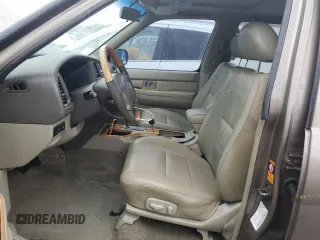2001 Infiniti QX4 Luxury z VIN JNRDR07X81W103465, wystawiony jako Copart lot #73761114 z przebiegiem 160 676 mil mil oraz Szkody całkowita. Historia ofert i sprzedaży dostępna na DreamBid. Obrazek 7.