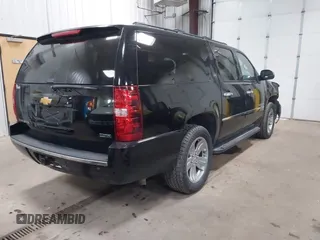 2012 Chevrolet Suburban LTZ with VIN 1GNSKKE77CR326924, listed as a IAAI auction lot 41764487 with 198,224 mi miles. Bid and sale history available at carsss.com. Image 4.