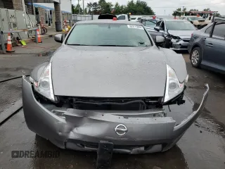2009 Nissan 370Z Touring with VIN JN1AZ44E69M404789, listed as a Copart auction lot 62015094 with 56,447 mi miles and Salvage Title. Bid and sale history available at carsss.com. Image 5.