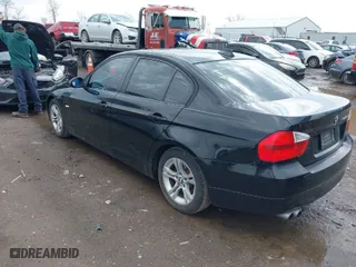 2008 BMW 3 Series 328xi with VIN WBAVC93588K044348, listed as a IAAI auction lot 41915673 with 172,403 mi miles. Bid and sale history available at carsss.com. Image 3.