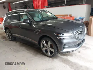 2023 Genesis GV80 z VIN KMUHBDSBXPU112470, wystawiony jako IAAI lot #42326878 z przebiegiem 28 302 mil mil oraz . Historia ofert i sprzedaży dostępna na DreamBid. Obrazek 1.