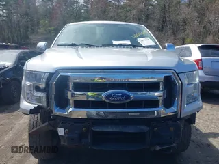 2015 Ford F-150 XLT with VIN 1FTEW1EG5FFA40936, listed as a IAAI auction lot 42011697 with 199,722 mi miles. Bid and sale history available at carsss.com. Image 12.