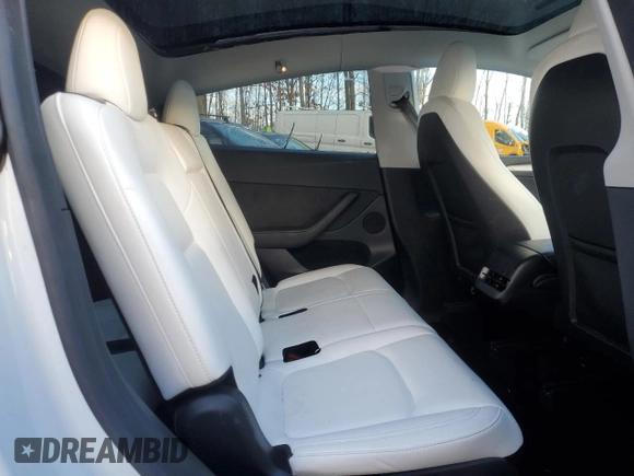 2023 Tesla Model Y Long Range with VIN 7SAYGAEE1PF967353, listed as a Copart auction lot 88700135 with 16,249 mi miles and Salvage Title. Bid and sale history available at DreamBid. Image 10.