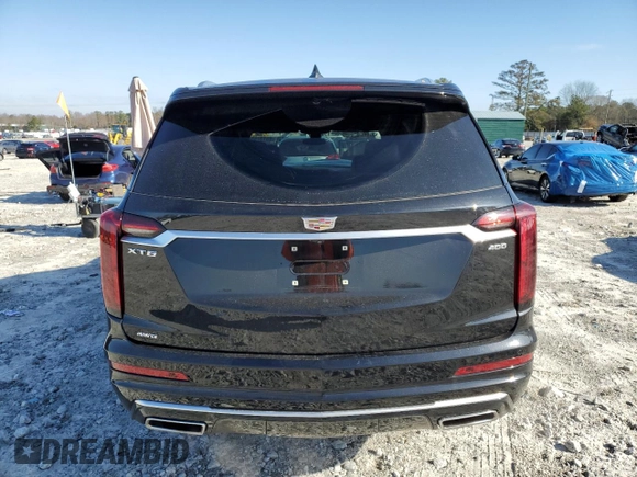 2021 Cadillac XT6 Premium Luxury z VIN 1GYKPDRS6MZ150397, wystawiony jako Copart lot #85137654 z przebiegiem 52 305 mil mil oraz Szkoda całkowita • Salvage title. Historia ofert i sprzedaży dostępna na DreamBid. Obrazek 6.