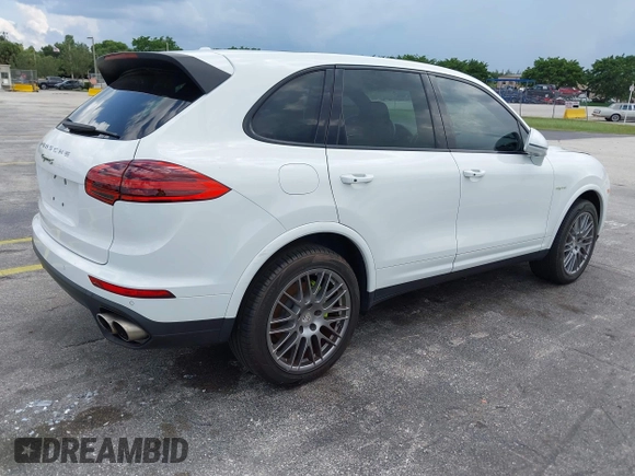 2016 Porsche Cayenne S E-Hybrid with VIN WP1AE2A25GLA63698, listed as a IAAI auction lot 42694555 with 141,957 mi miles and . Bid and sale history available at DreamBid. Image 4.