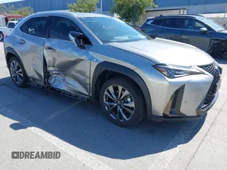 2021 Lexus UX 250h F Sport with VIN JTHR9JBH0M2037127, listed as a IAAI auction lot 42156811 with 20,720 mi miles and . Bid and sale history available at DreamBid. Image 1.