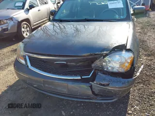 2005 Ford Five Hundred SE z VIN 1FAFP231X5G145153, wystawiony jako IAAI lot #42059747 z przebiegiem 59 114 mil mil oraz . Historia ofert i sprzedaży dostępna na DreamBid. Obrazek 6.