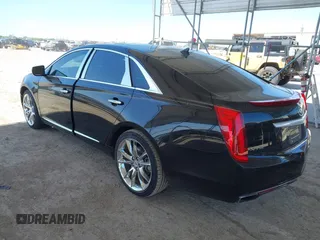 2013 Cadillac XTS Premium z VIN 2G61S5S36D9128244, wystawiony jako IAAI lot #41976485 z przebiegiem 88 033 mil mil oraz . Historia ofert i sprzedaży dostępna na DreamBid. Obrazek 3.