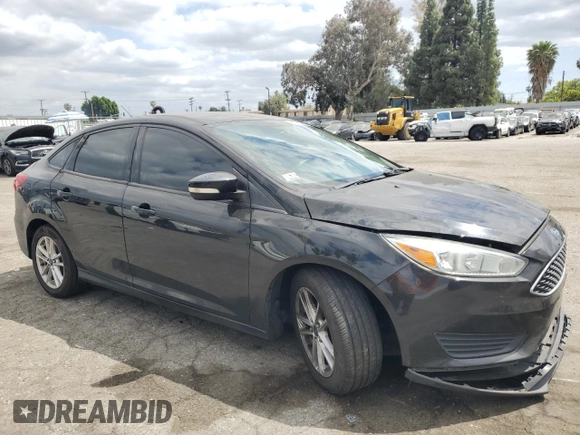 2015 Ford Focus SE with VIN 1FADP3F20FL249872, listed as a Copart auction lot 53506885 with 97,078 mi miles and Salvage title. Bid and sale history available at DreamBid. Image 4.