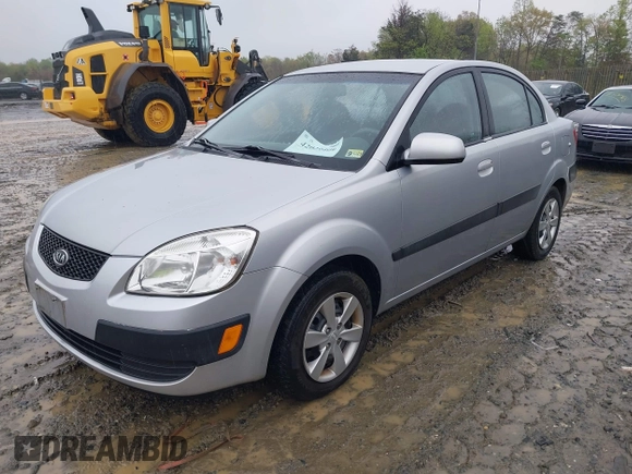 2009 Kia Rio SX with VIN KNADE223596538965, listed as a IAAI auction lot 42029409 with 143,794 mi miles. Bid and sale history available at carsss.com. Image 2.