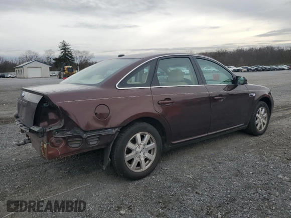2009 Ford Taurus SE with VIN 1FAHP23W89G125025, listed as a Copart auction lot 80710004 with 114,176 mi miles and Salvage Title. Bid and sale history available at carsss.com. Image 3.