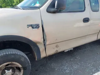 1999 Ford F-150 z VIN 1FTRX18W9XNB33354, wystawiony jako IAAI lot #42380827 z przebiegiem Nie podano mil oraz . Historia ofert i sprzedaży dostępna na DreamBid. Obrazek 6.