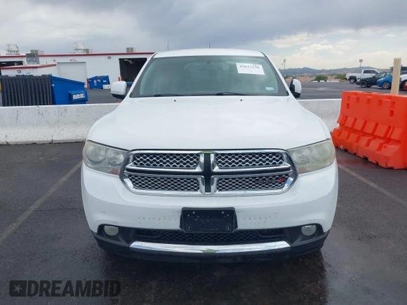 2013 Dodge Durango SXT with VIN 1C4RDJAG7DC659050, listed as a IAAI auction lot 42637236 with 162,458 mi miles and . Bid and sale history available at DreamBid. Image 6.
