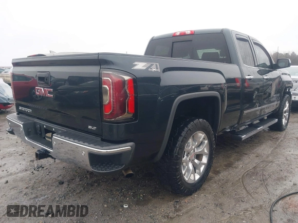2017 GMC Sierra 1500 SLT z VIN 1GTV2NEC5HZ180843, wystawiony jako IAAI lot #41509410 z przebiegiem 89 943 mil mil oraz . Historia ofert i sprzedaży dostępna na DreamBid. Obrazek 4.