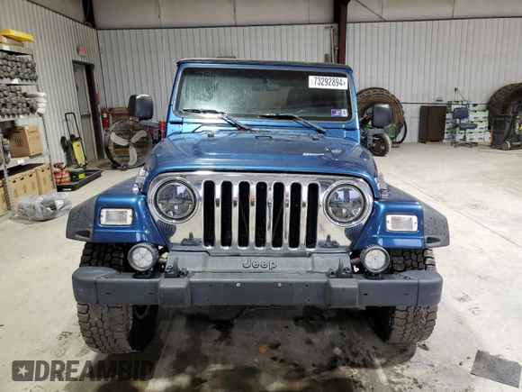 2003 Jeep Wrangler Sport with VIN 1J4FA49S23P344132, listed as a Copart auction lot 73292894 with 147,252 mi miles and Salvage Title. Bid and sale history available at carsss.com. Image 5.