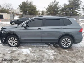 2018 Volkswagen Tiguan S with VIN 3VV0B7AX1JM143571, listed as a IAAI auction lot 41555436 with 72,545 mi miles. Bid and sale history available at carsss.com. Image 14.
