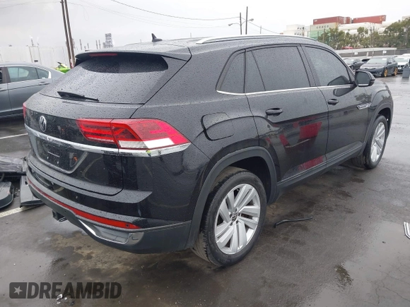 2022 Volkswagen Atlas SE z VIN 1V2WE2CA3NC203707, wystawiony jako IAAI lot #41720912 z przebiegiem 50 572 mil mil oraz . Historia ofert i sprzedaży dostępna na DreamBid. Obrazek 4.
